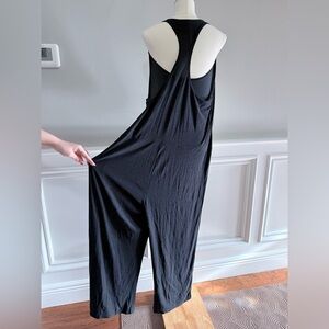 Featherweight Hangloose Black Sleeveless Jumpsuit by Beyond Yoga.